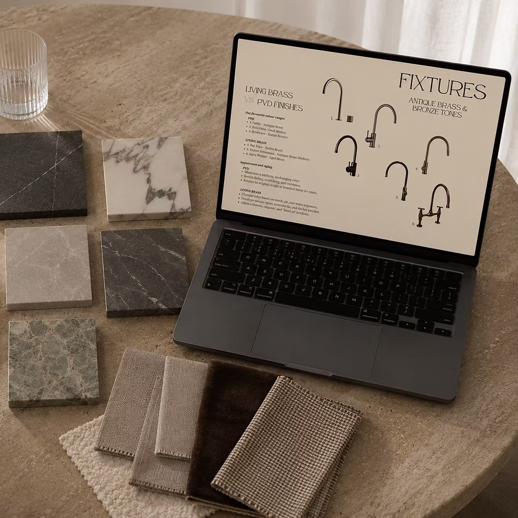 A laptop showing the fixtures page of the specification, with stone samples and fabric swatches